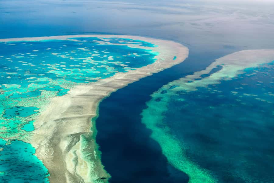 Airlie Beach: Whitsunday Islands & Heart Reef Scenic Flight - Boarding a small plane with a clear view below