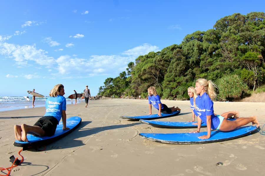 Byron Bay: 2-Hour Small Group Surf Lesson - Moving into the water at Byron Bay