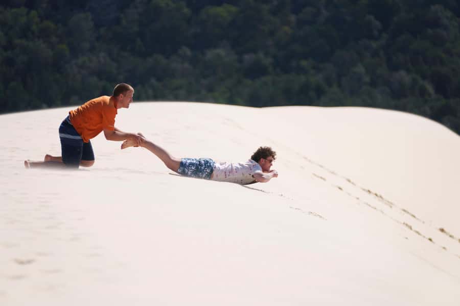 From Brisbane: Moreton Island Full-Day Trip - Sand tobogganing in The Desert