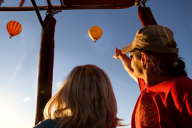 Gold Coast Hot Air Balloon + Winery Breakfast + Return Transfers - Watching the Balloon Rise at Dawn