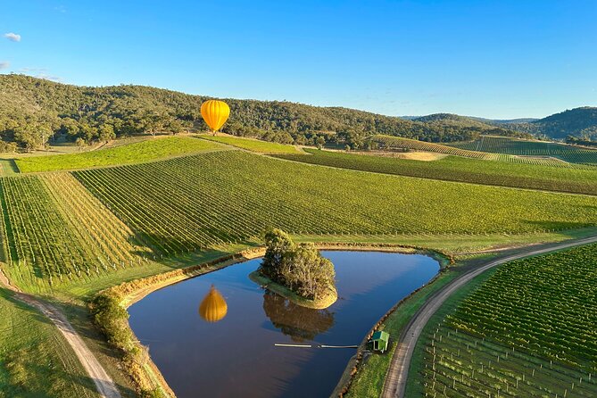 Yarra Valley Sunrise Balloon Flight with GoPro Photos - Sunrise over vineyards, hills, and morning mist